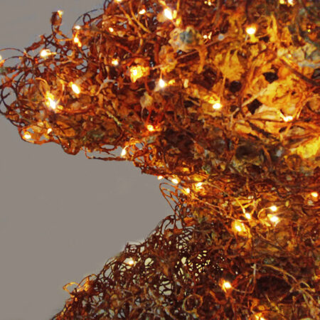 Detail of the light sculpture" Mermaid evening dress", wire , paper pulp and gold leaf